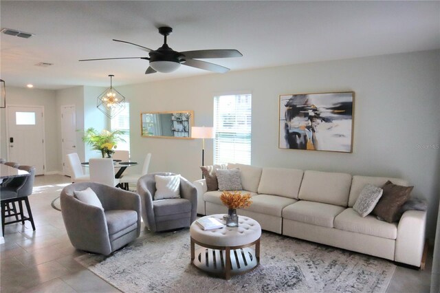 living room featuring ceiling fan