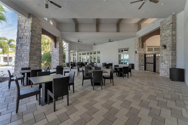 view of patio featuring ceiling fan