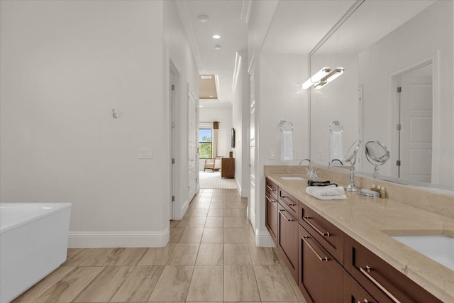 bathroom with a bath and vanity