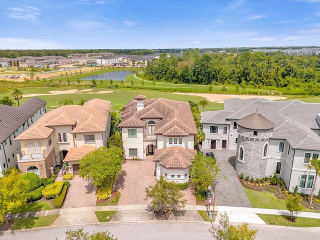 bird's eye view with a water view