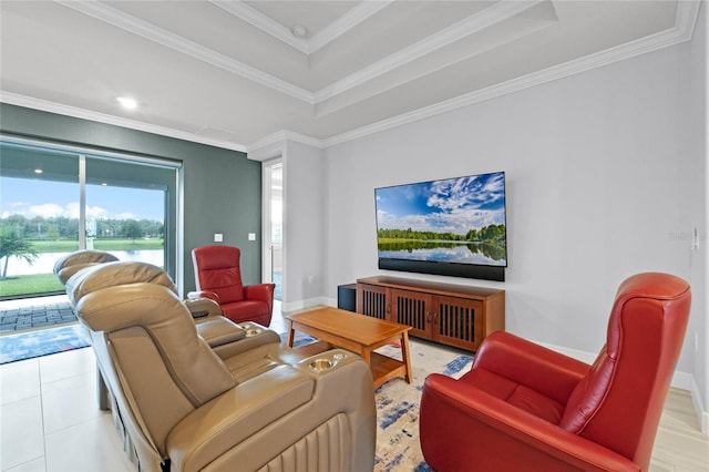 living room featuring ornamental molding and a tray ceiling