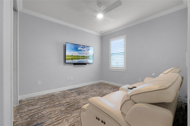 living area with ceiling fan, hardwood / wood-style flooring, and crown molding