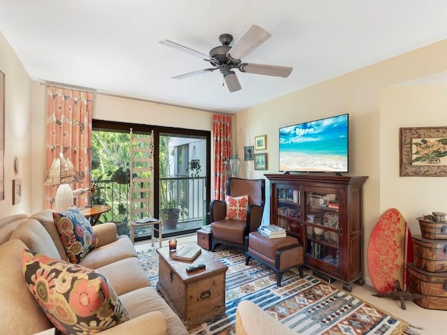 living area featuring ceiling fan