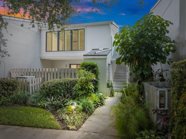 view of property exterior at dusk