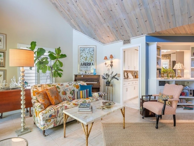 living area featuring lofted ceiling, visible vents, wooden ceiling, and light tile patterned flooring