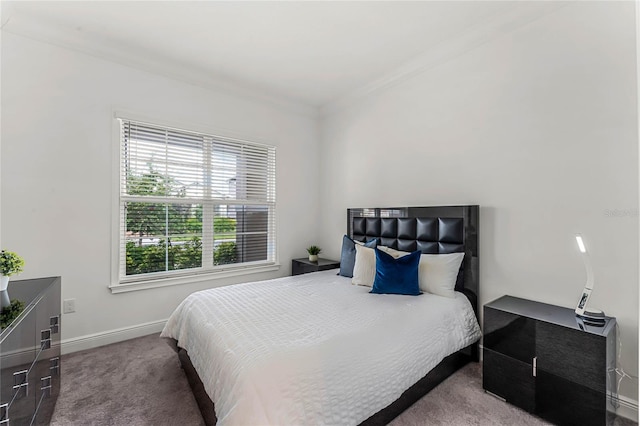 bedroom with carpet floors and ornamental molding