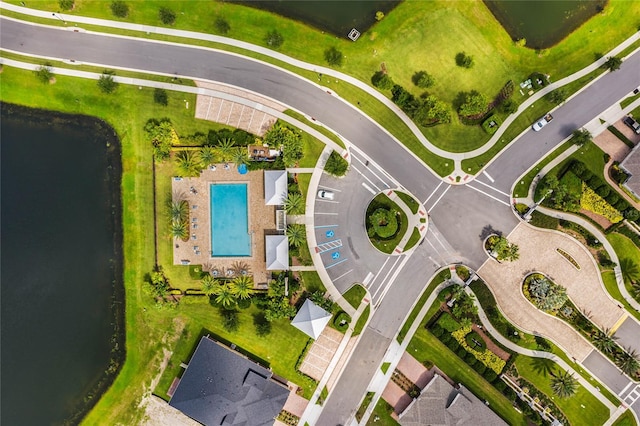 drone / aerial view with a water view