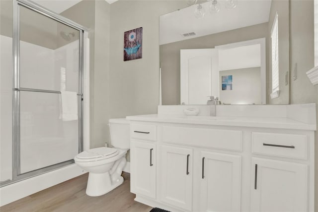 188 Ridgemont Ct, Davenport, FL 33896 - full bath with wood finished floors, vanity, and a shower stall