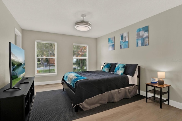 bedroom featuring light hardwood / wood-style floors