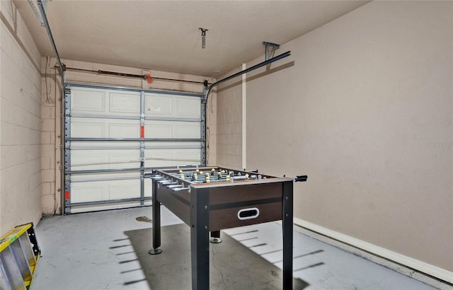 188 Ridgemont Ct, Davenport, FL 33896 - playroom featuring concrete flooring and a garage