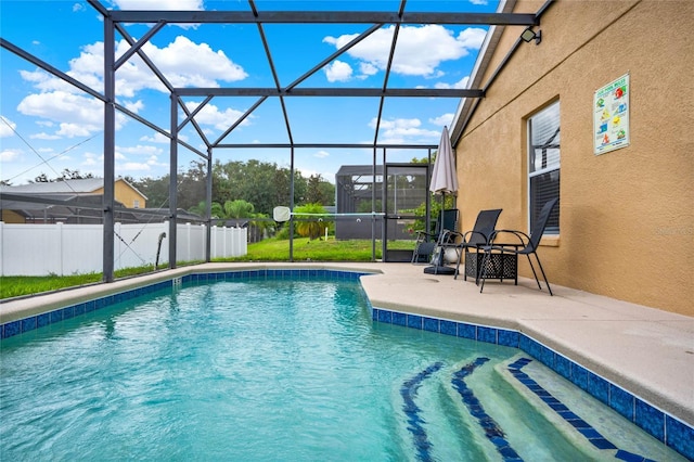 188 Ridgemont Ct, Davenport, FL 33896 - view of pool featuring a patio and glass enclosure
