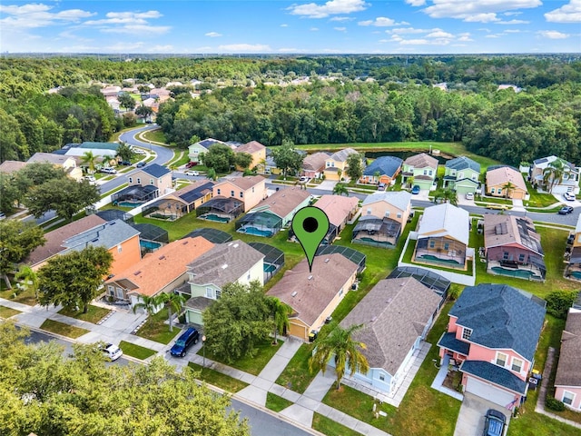 188 Ridgemont Ct, Davenport, FL 33896 - aerial view of property and surrounding area featuring nearby suburban area and a heavily wooded area