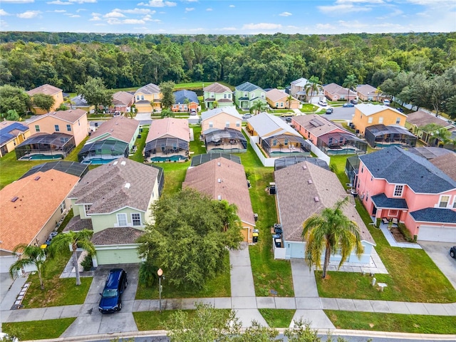 188 Ridgemont Ct, Davenport, FL 33896 - aerial view of residential area with a forest