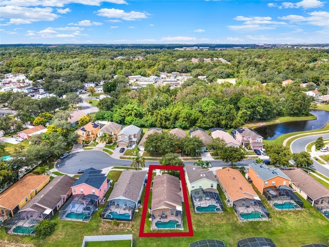 188 Ridgemont Ct, Davenport, FL 33896 - aerial perspective of suburban area with property boundaries highlighted and a large body of water
