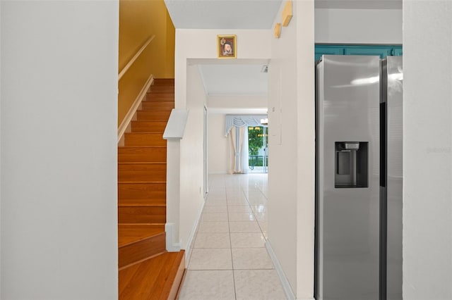 corridor with light tile patterned flooring