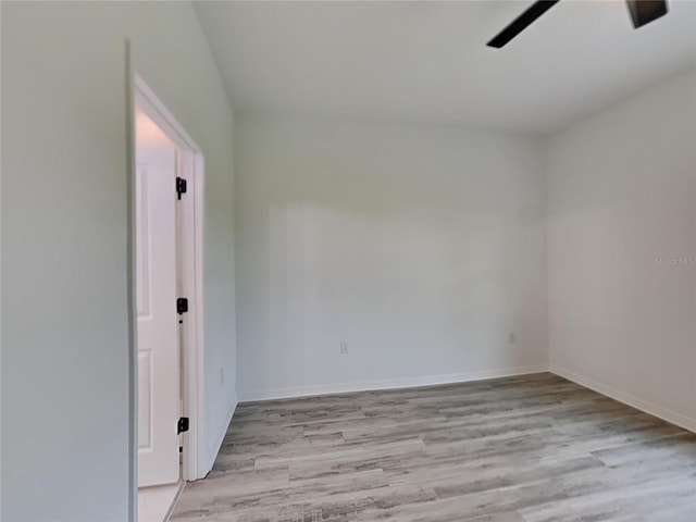 unfurnished room featuring light hardwood / wood-style floors and ceiling fan