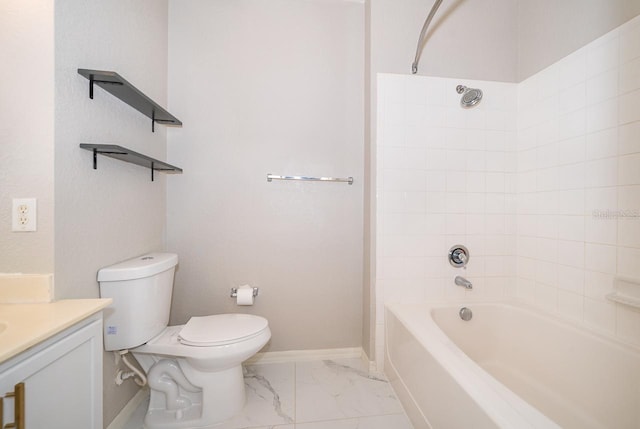 full bathroom with vanity, toilet, and tiled shower / bath