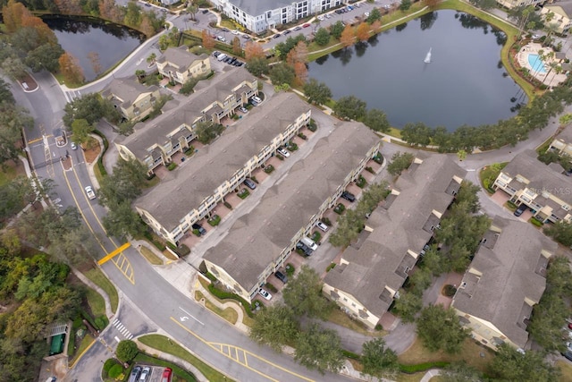 drone / aerial view with a water view