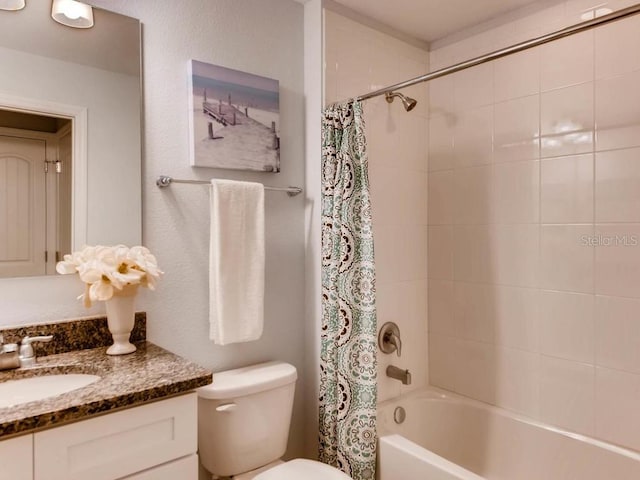 full bathroom with shower / bathtub combination with curtain, vanity, and toilet