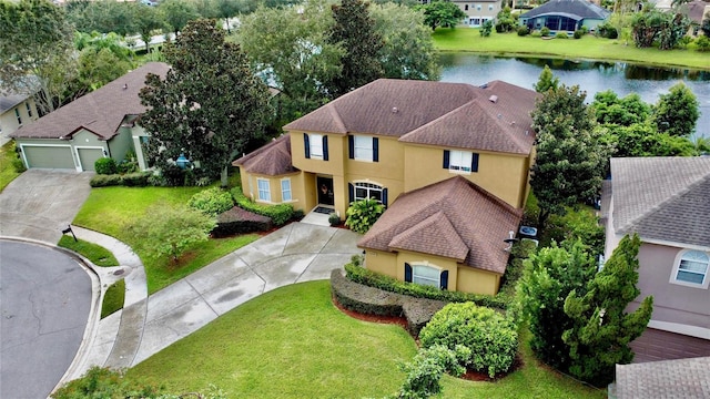 drone / aerial view with a water view