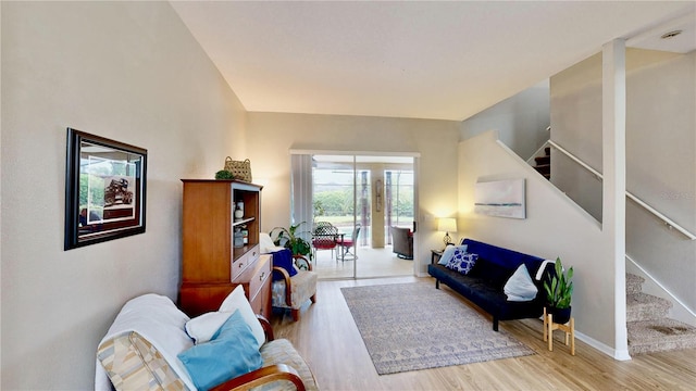 living room with light hardwood / wood-style flooring