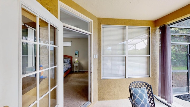 sunroom featuring plenty of natural light