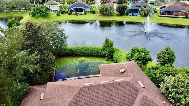 bird's eye view with a water view