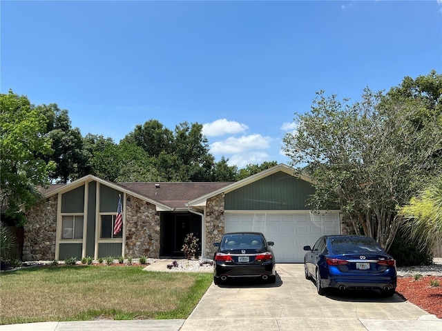 single story home with a garage and a front lawn