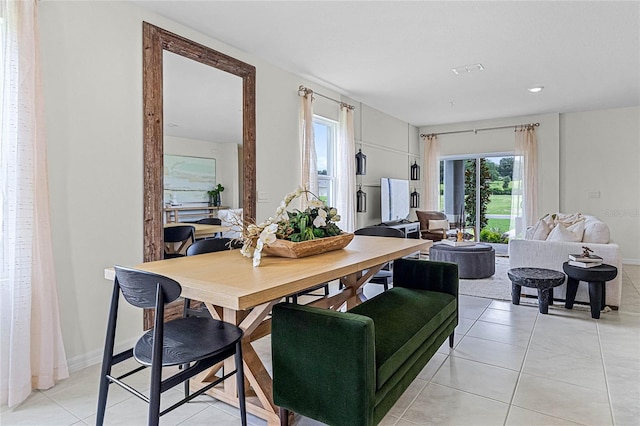 dining room featuring light tile patterned floors