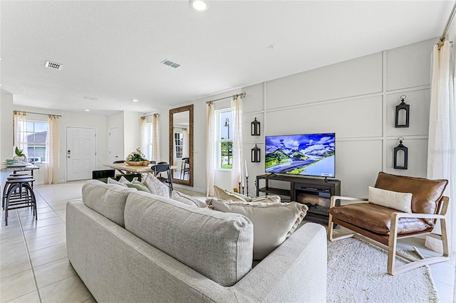 living room featuring light tile patterned floors