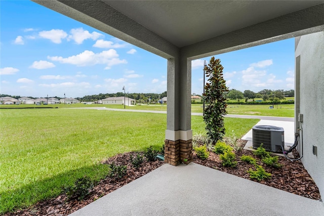 view of yard featuring central AC