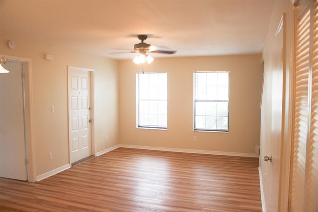 unfurnished bedroom with hardwood / wood-style flooring and ceiling fan