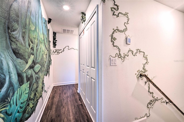 hallway featuring dark wood-type flooring