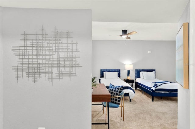 bedroom with carpet floors and a ceiling fan