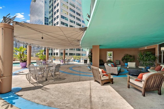 view of patio / terrace with an outdoor hangout area and outdoor dining space
