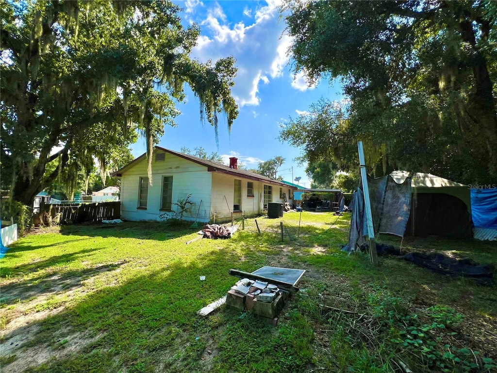 view of yard featuring central AC