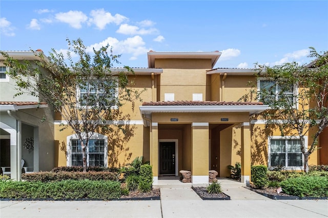 8947 Bismarck Palm Rd, Kissimmee, FL 34747 - view of front of property with stucco siding