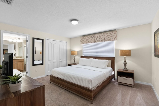 8947 Bismarck Palm Rd, Kissimmee, FL 34747 - bedroom featuring visible vents, baseboards, carpet floors, and a closet