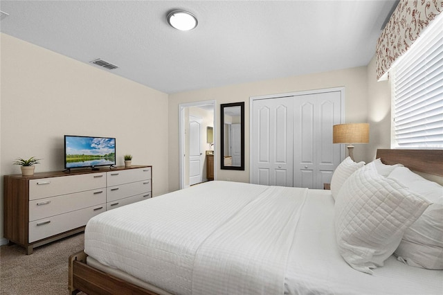 8947 Bismarck Palm Rd, Kissimmee, FL 34747 - bedroom with carpet floors, a closet, and visible vents
