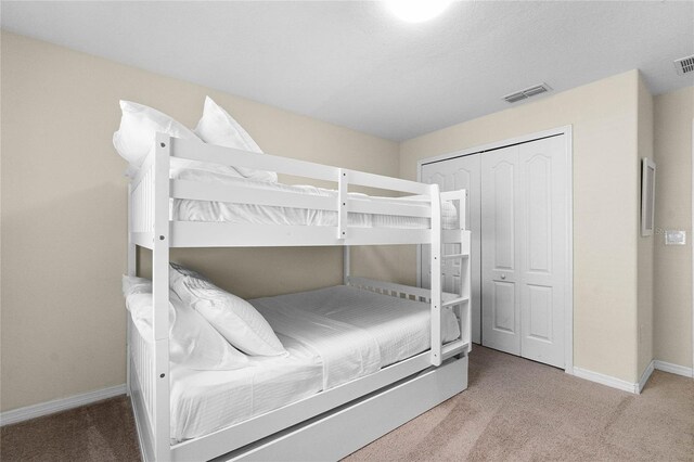 8947 Bismarck Palm Rd, Kissimmee, FL 34747 - bedroom with visible vents, carpet, and baseboards