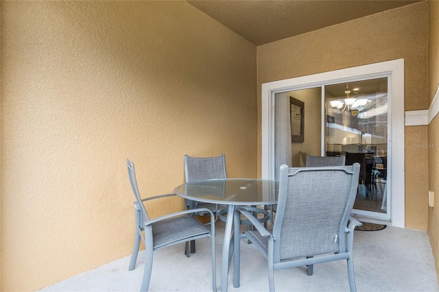 8947 Bismarck Palm Rd, Kissimmee, FL 34747 - exterior space with an inviting chandelier and a textured wall