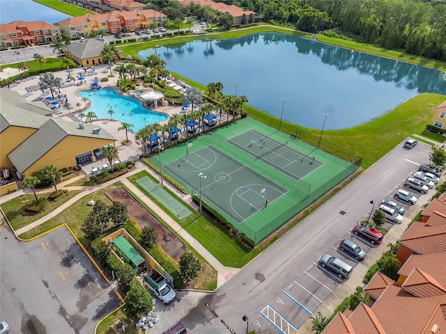 birds eye view of property featuring a water view