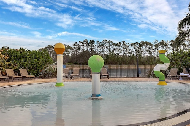8947 Bismarck Palm Rd, Kissimmee, FL 34747 - view of pool featuring a water slide and fence