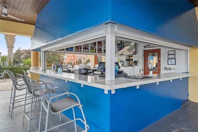8947 Bismarck Palm Rd, Kissimmee, FL 34747 - view of patio / terrace featuring outdoor dry bar and a ceiling fan