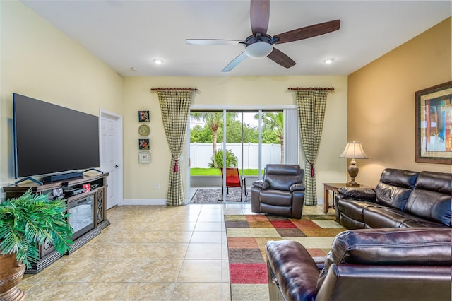 living room with ceiling fan and light tile patterned floors