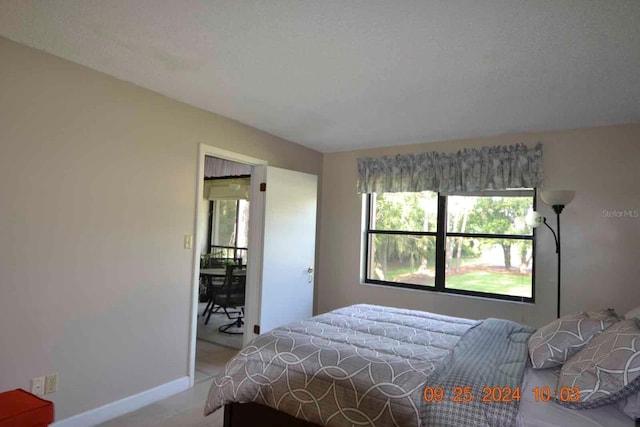 bedroom with baseboards