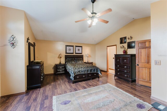 bedroom featuring vaulted ceiling, dark hardwood / wood-style flooring, and ceiling fan