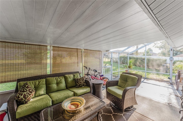 sunroom / solarium featuring wooden ceiling