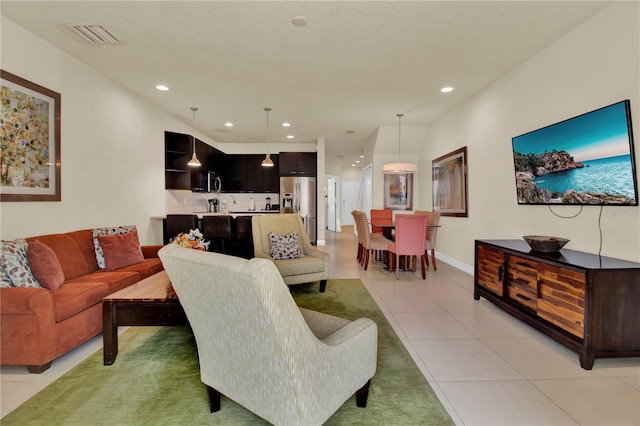 living room featuring light tile patterned floors