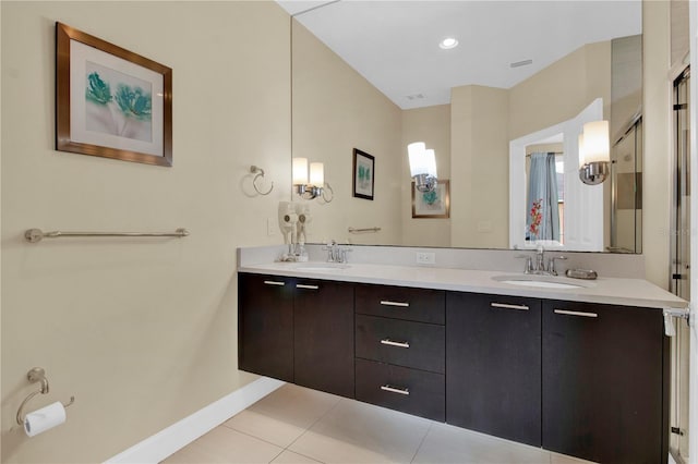 bathroom featuring tile patterned floors and vanity